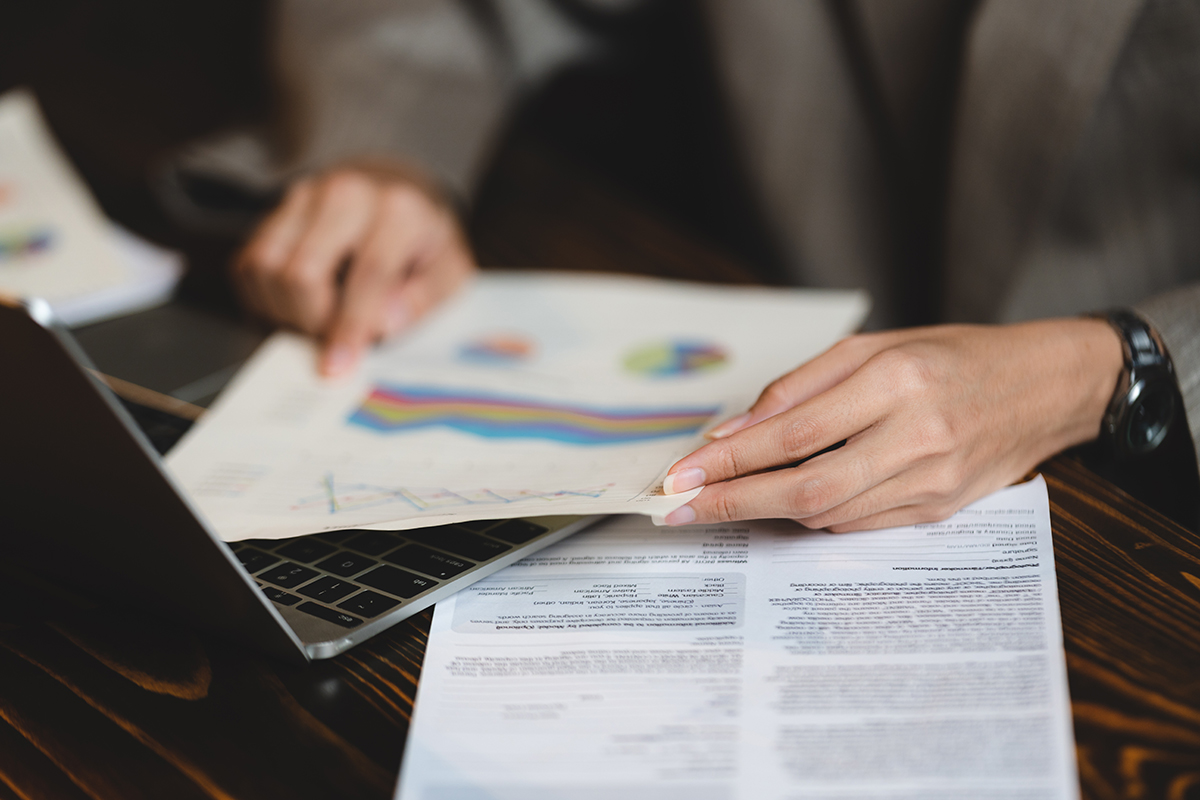 Financial expert reviewing valuation analysis to determine standard of value